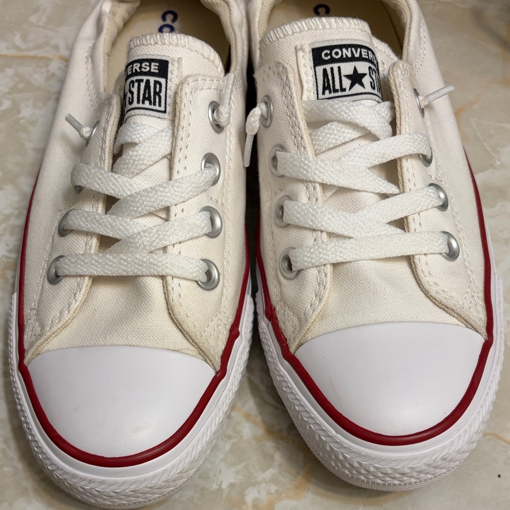 Converse cream and red low cut, worn once or twice. Size 8 us 38 Eur